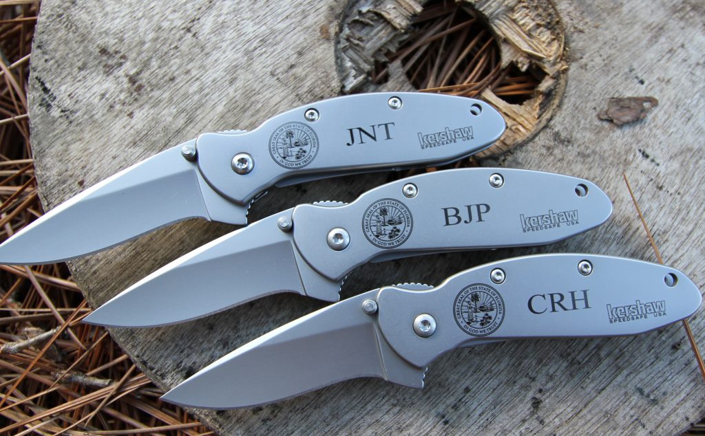 Laser engraving intricate on Kershaw Scallion knives